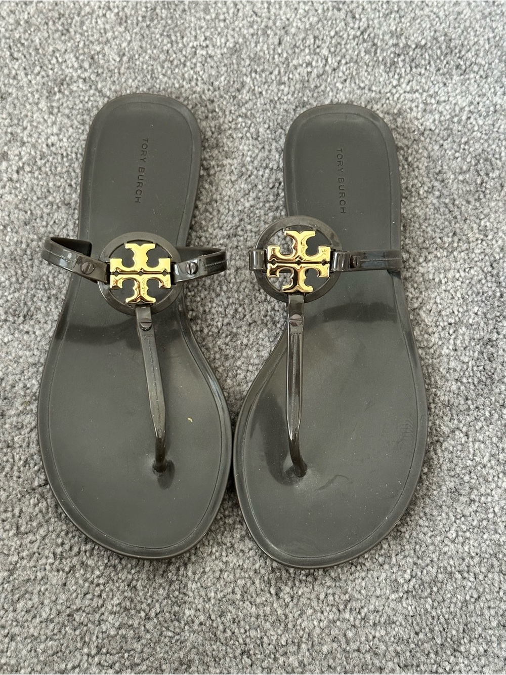 Tory Burch Black Jelly Thong Sandals with Gold Logo Accent